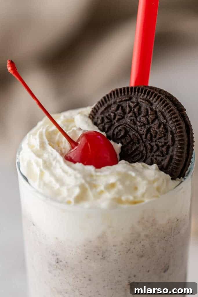 Close up of the Chick-fil-A Oreo milkshake with whipped cream
