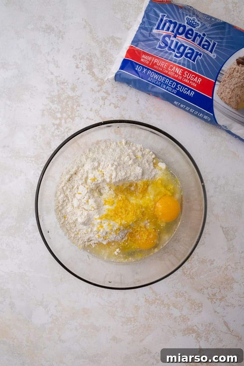 Perfectly Crinkled Lemon Cookies with Cake Mix 6 Cookie ingredients in bowl