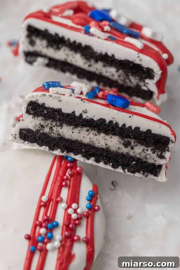 Red, White, & Blue Oreo Delights 8 A 4th of July chocolate covered Oreo cut in half, revealing the classic cookie inside.