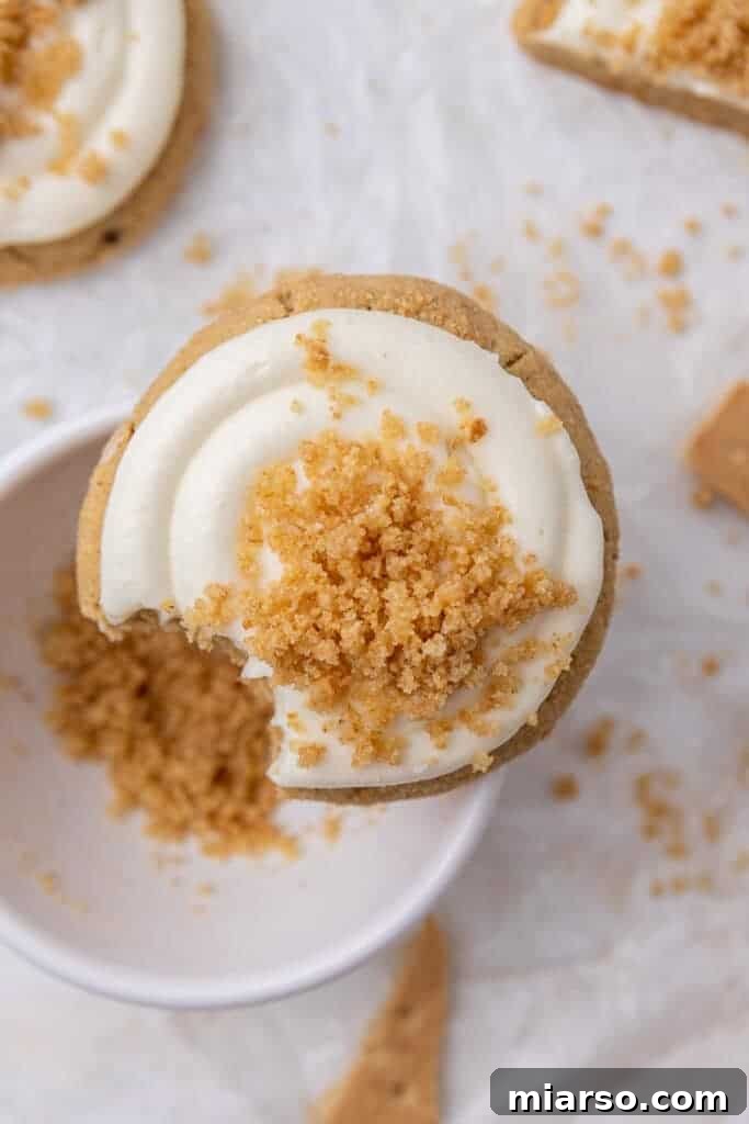 Crumbl NY cheesecake cookie with a bite taken out of it