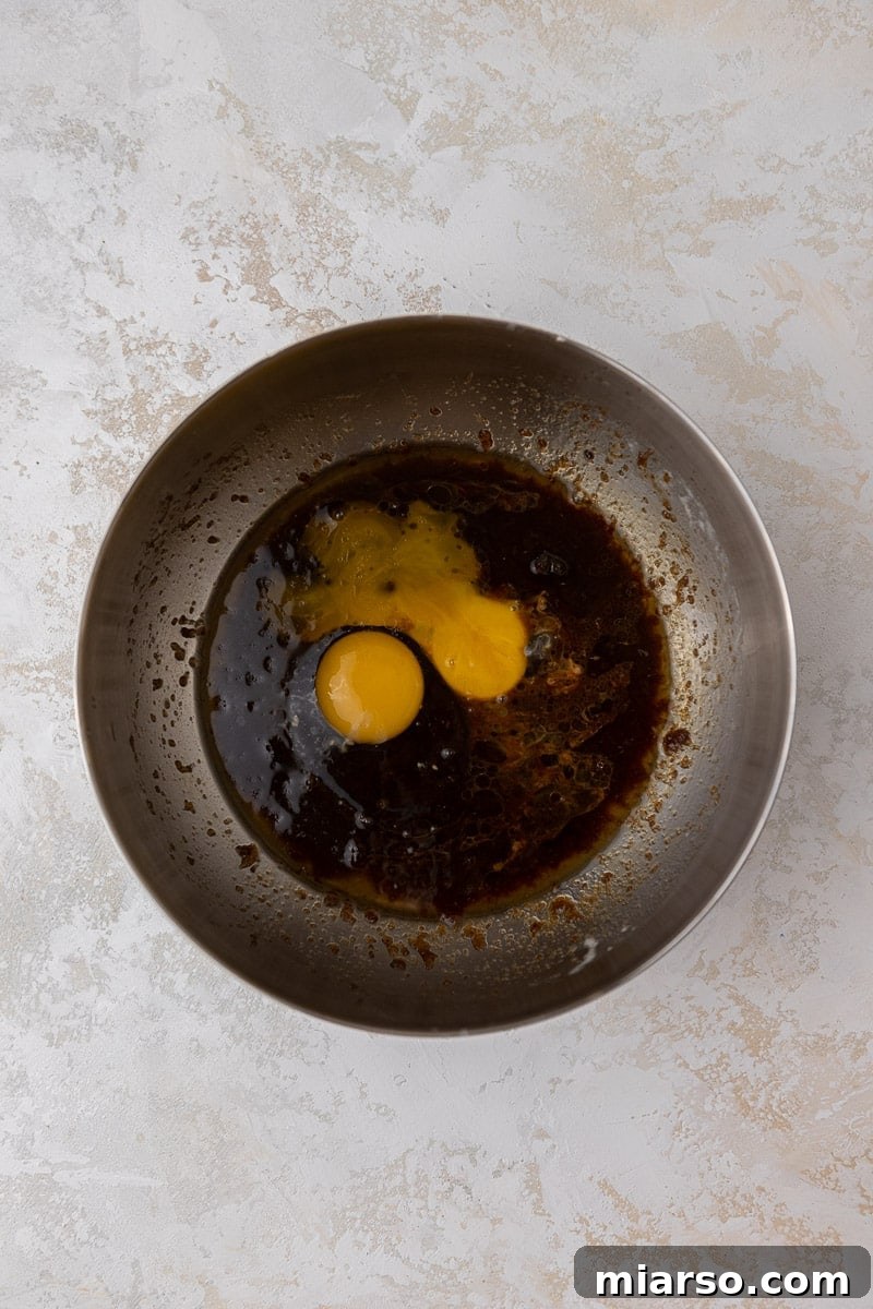 Creamed butter and eggs in a mixing bowl for blondies
