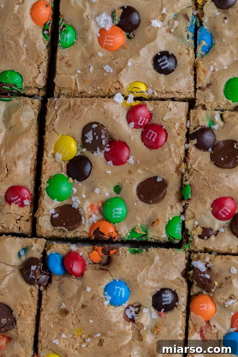Chewy M&M blondies cut into squares