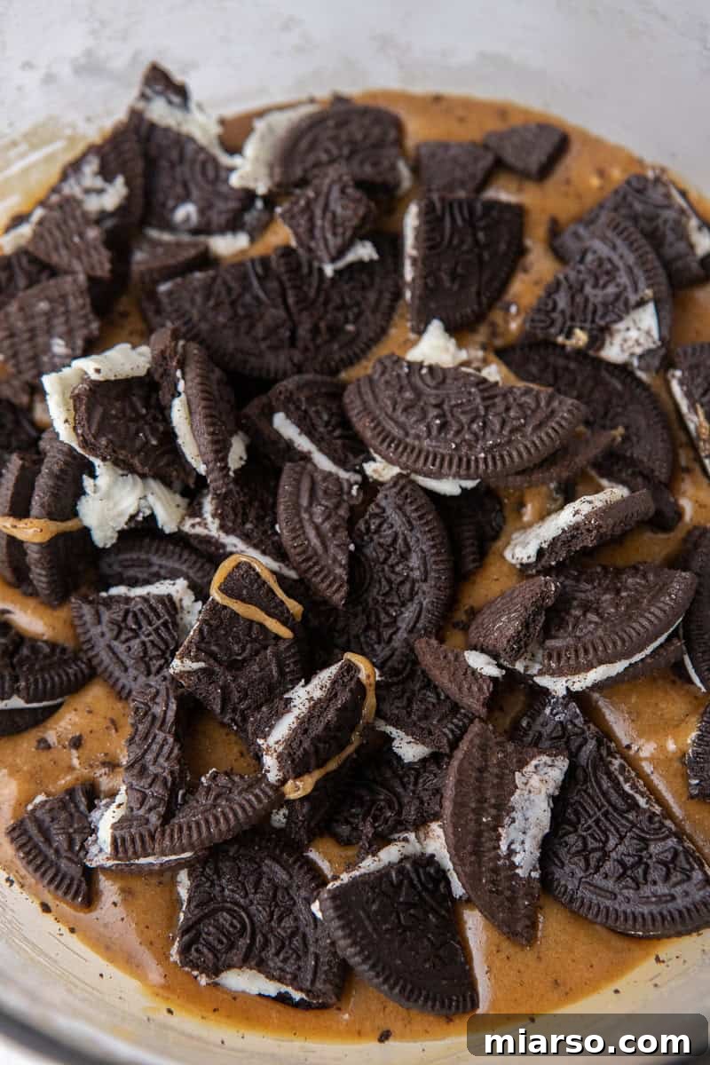 Decadent Oreo Blondie Delights 6 Oreo bits folded into cookie dough