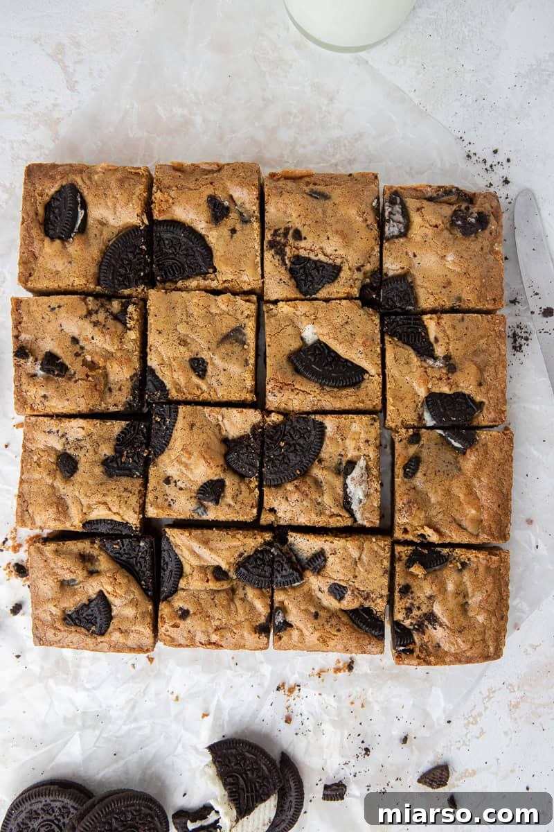 Decadent Oreo Blondie Delights 8 Freshly baked brown butter Oreo blondies in a pan