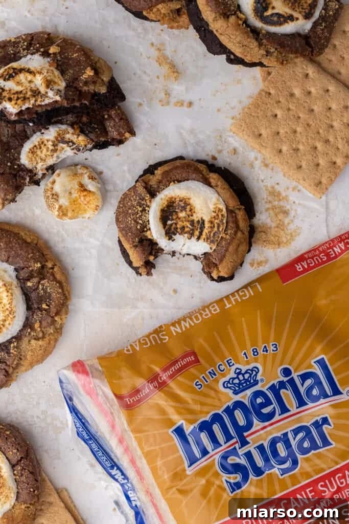 Imperial Sugar packaging next to Crumbl S'mores brownie cookies
