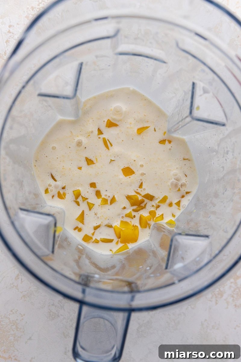 Peach milkshake in blender