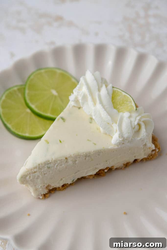 Slic eof no bake key lime pie on a plate