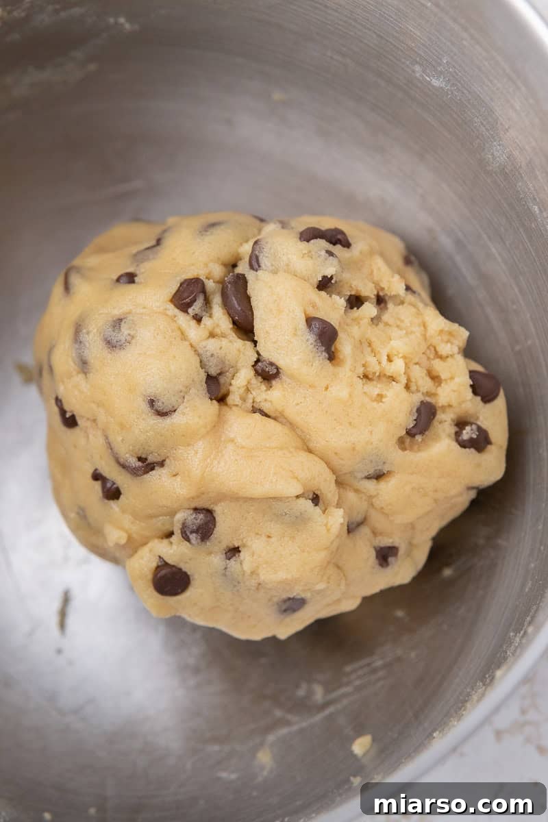 Unlock the Secret to Your Perfect Single Serve Chocolate Chip Cookie 8 Chocolate chip cookie dough resting in a bowl, perfectly mixed and awaiting its transformation.