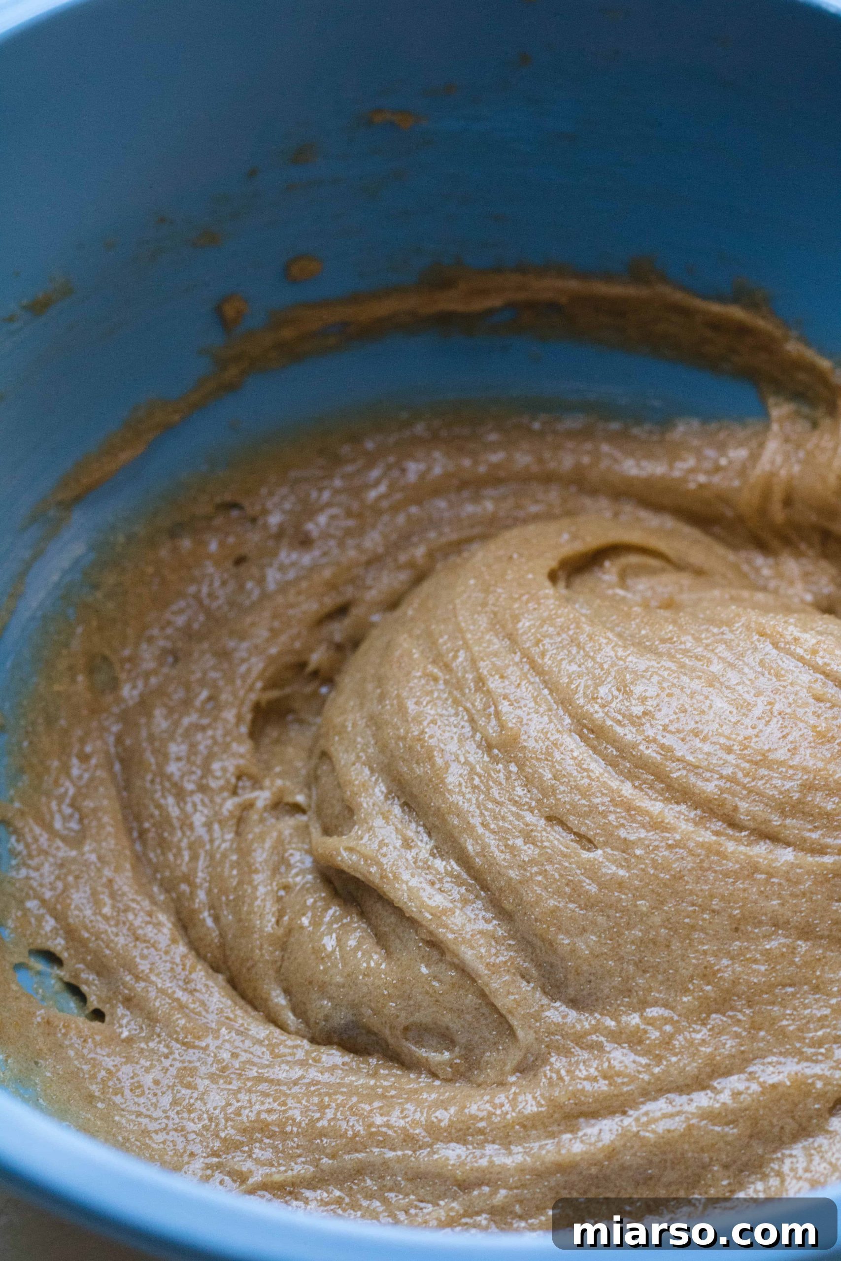 The perfectly mixed brown butter blondie wet ingredients, glossy and ready for dry ingredients.
