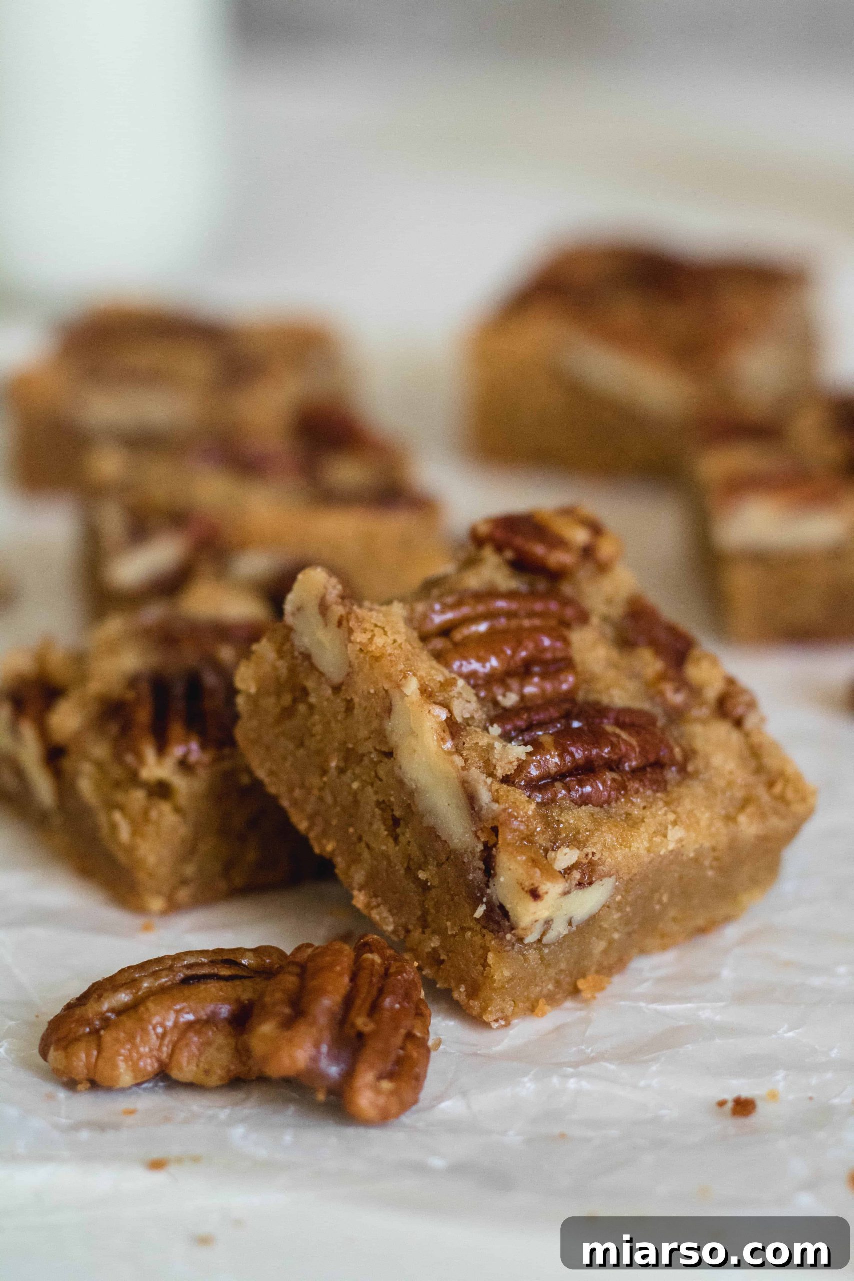 A cross-section of a blondie, revealing its dense, super buttery center and rich texture.