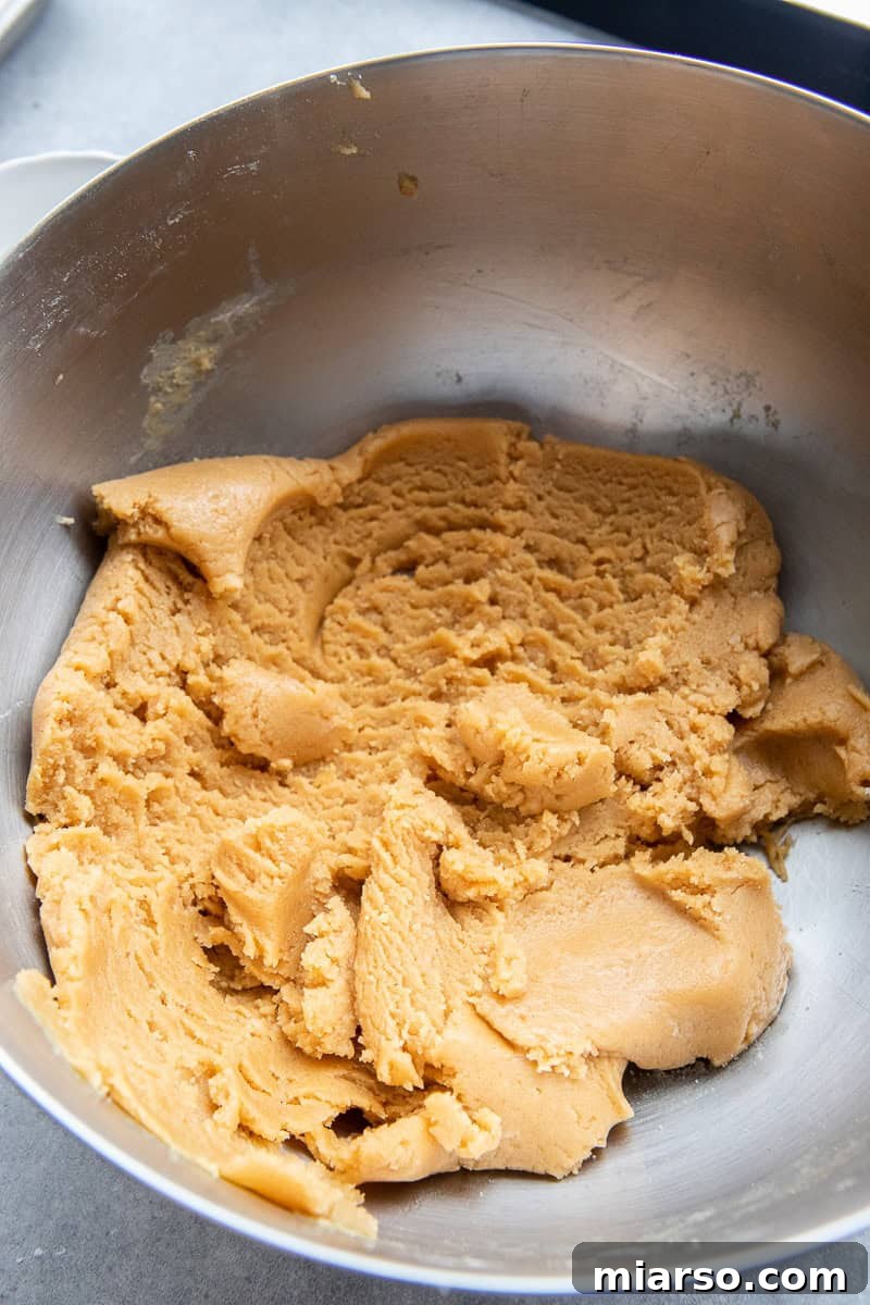 Ultimate Peanut Butter and Jelly Cookie Sandwich 6 Peanut butter cookie dough in a bowl