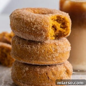 Close up of pumpkin spice donuts stacked
