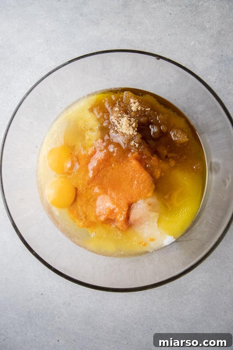 Decadent Pumpkin Spice Donut Perfection 5 Wet ingredients in a bowl