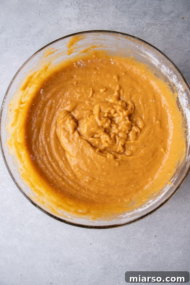 Decadent Pumpkin Spice Donut Perfection 6 Pumpkin donut batter in a bowl
