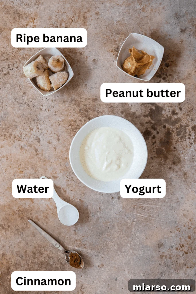 Frosty Peanut Butter Banana Pupsicles 3 Ingredients for homemade dog treats laid out on a kitchen counter