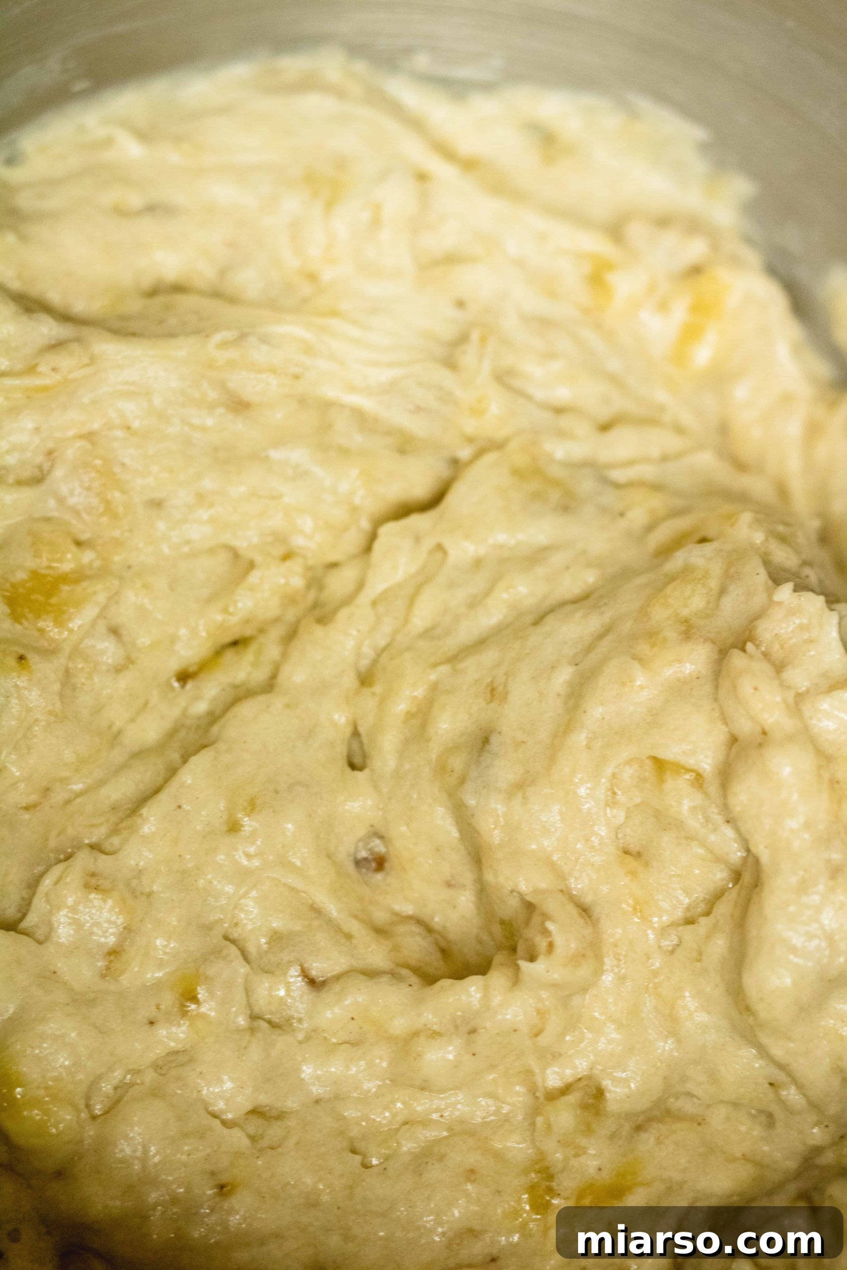 Bakery-Style Banana Walnut Muffins 16 The perfectly mixed sky high banana nut muffins batter, ready for baking
