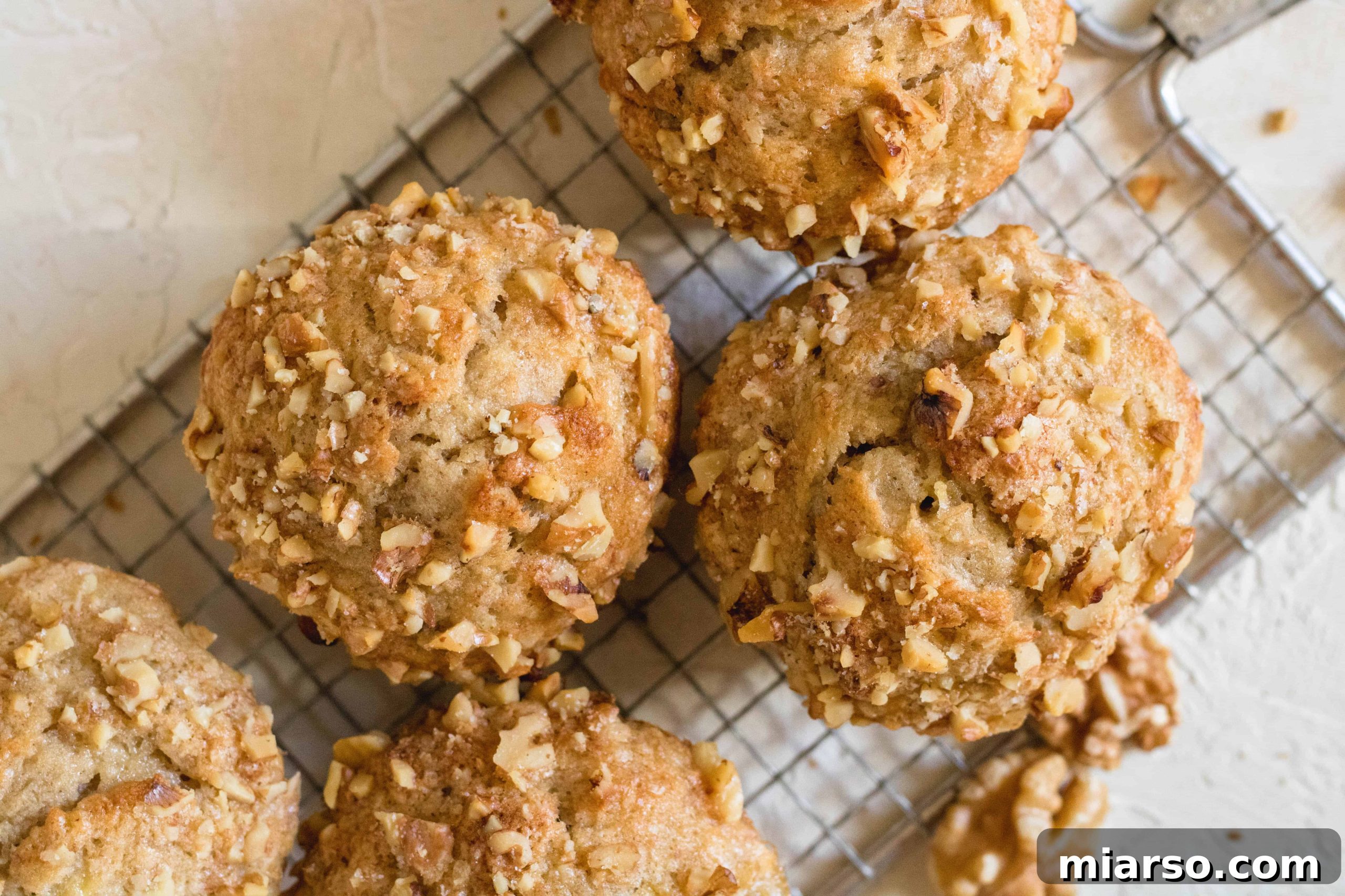 Bakery-Style Banana Walnut Muffins 20 A selection of baked banana walnut muffins, showcasing an easy and delicious recipe