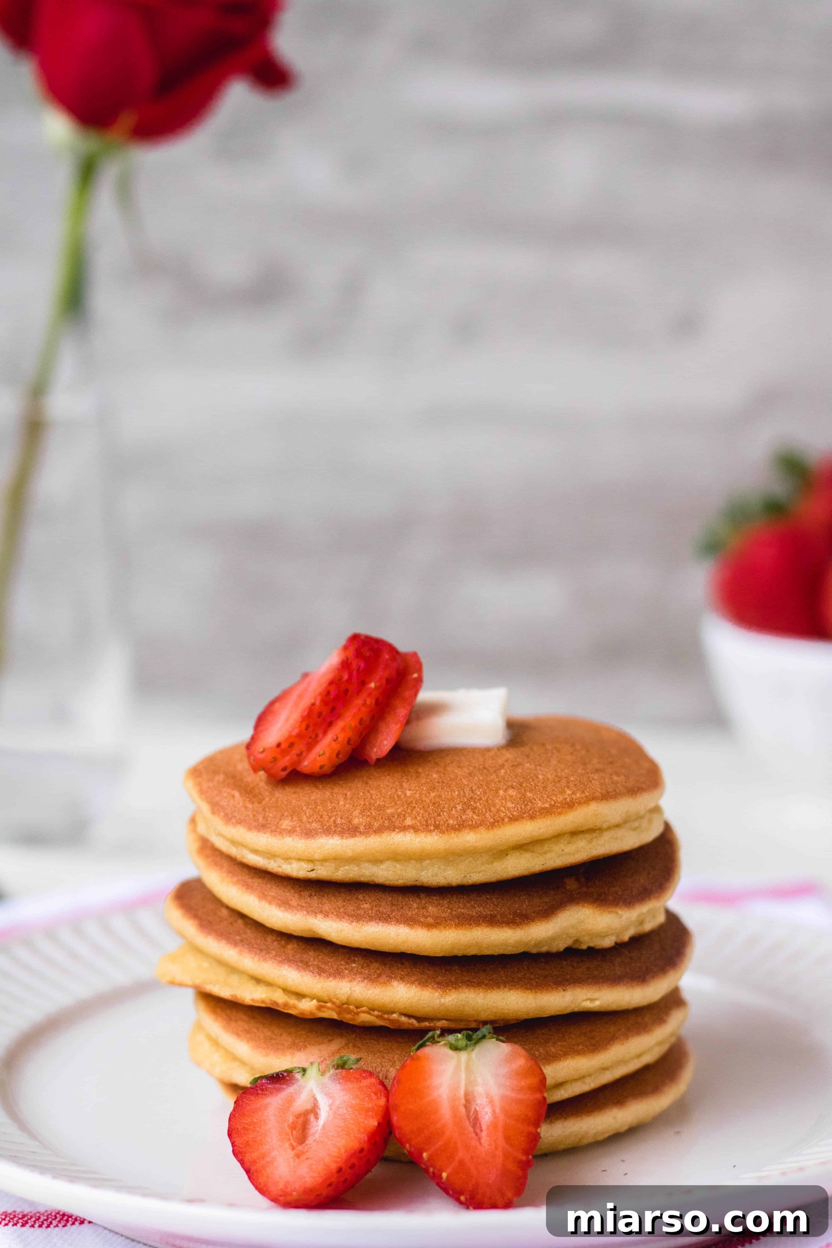 Ultimate Fluffy Almond Flour Pancakes 3 Preparing almond flour pancake batter on a counter