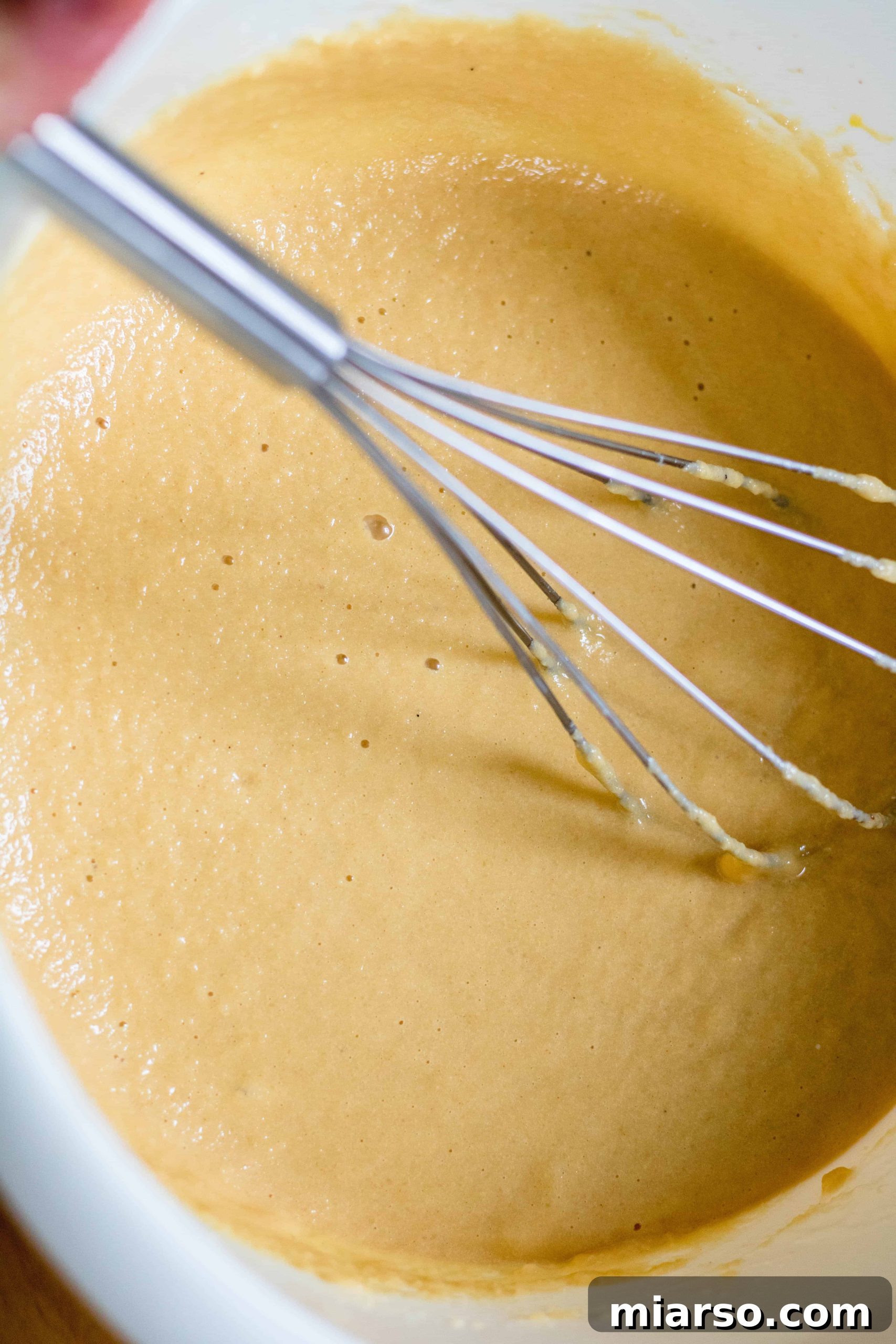 Ultimate Fluffy Almond Flour Pancakes 10 Batter of the healthy and fluffy almond flour pancakes using almond milk