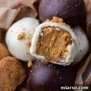 Pumpkin truffle with a bite taken out of it