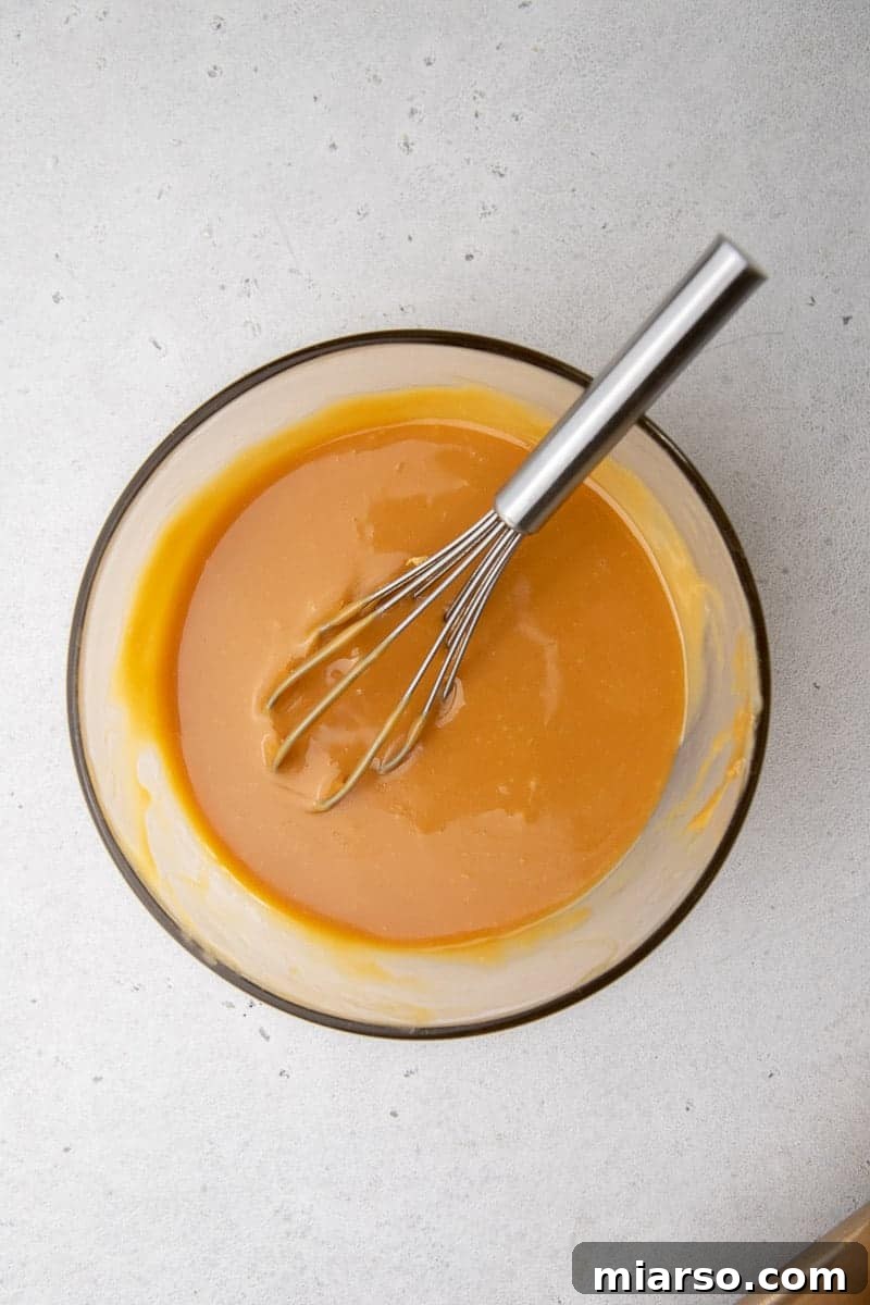 Decadent Salted Caramel Pretzel Bark 7 Melted caramel in a bowla