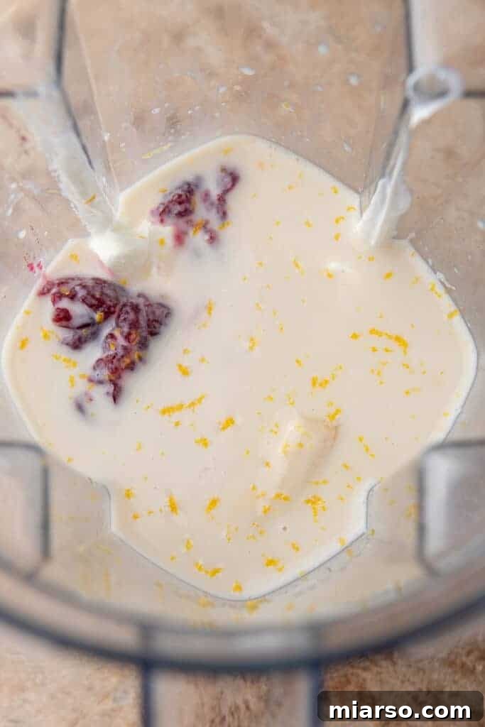 Cranberry Sauce Revival Smoothie 4 Ingredients in a blender