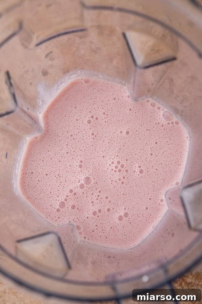 Cranberry Sauce Revival Smoothie 5 Ingredients in a blender