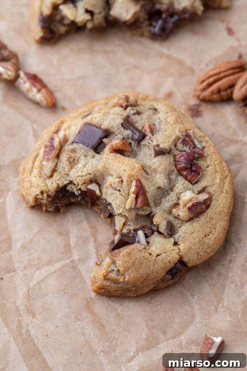 Stack of Chewy Brown Butter Pecan Chocolate Chip Cookies