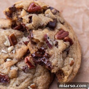 Pecan chocolate chip cookie broken in half