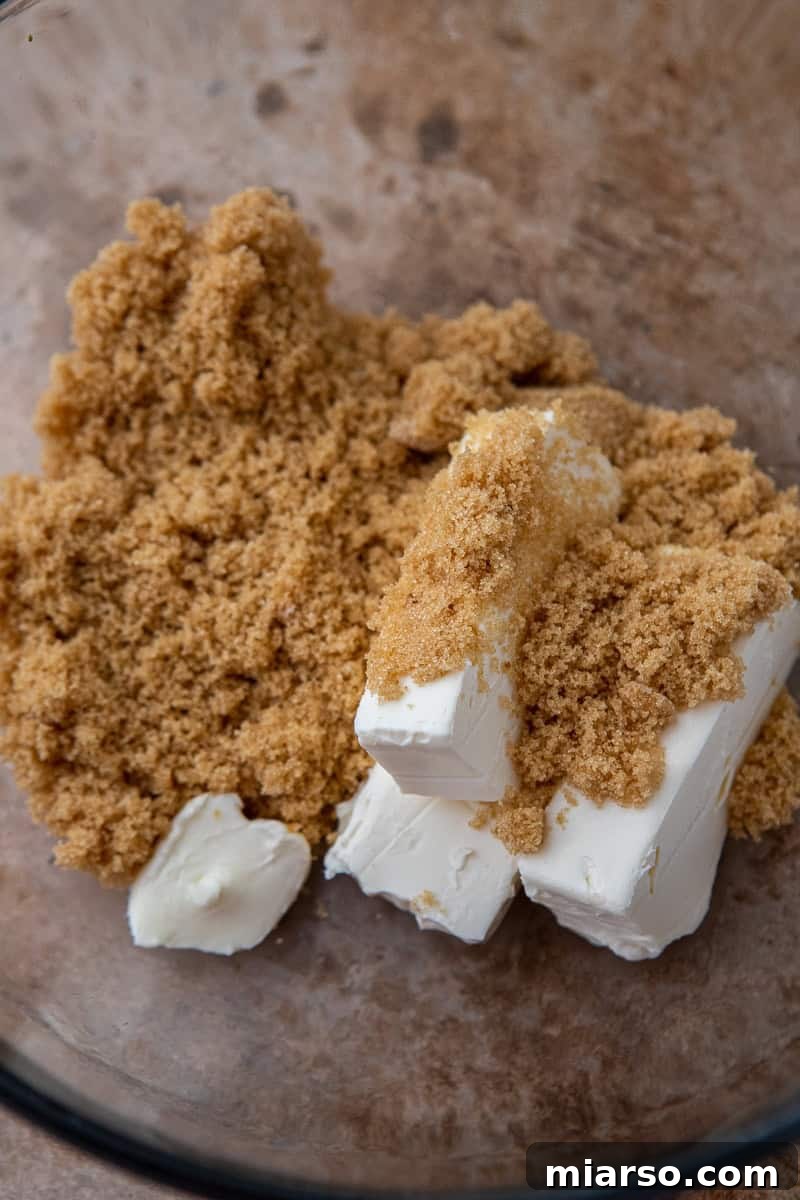 Pumpkin Pie Perfection Crumbl Style 6 Wet ingredients in a bowl for Crumbl pumpkin pie cookies