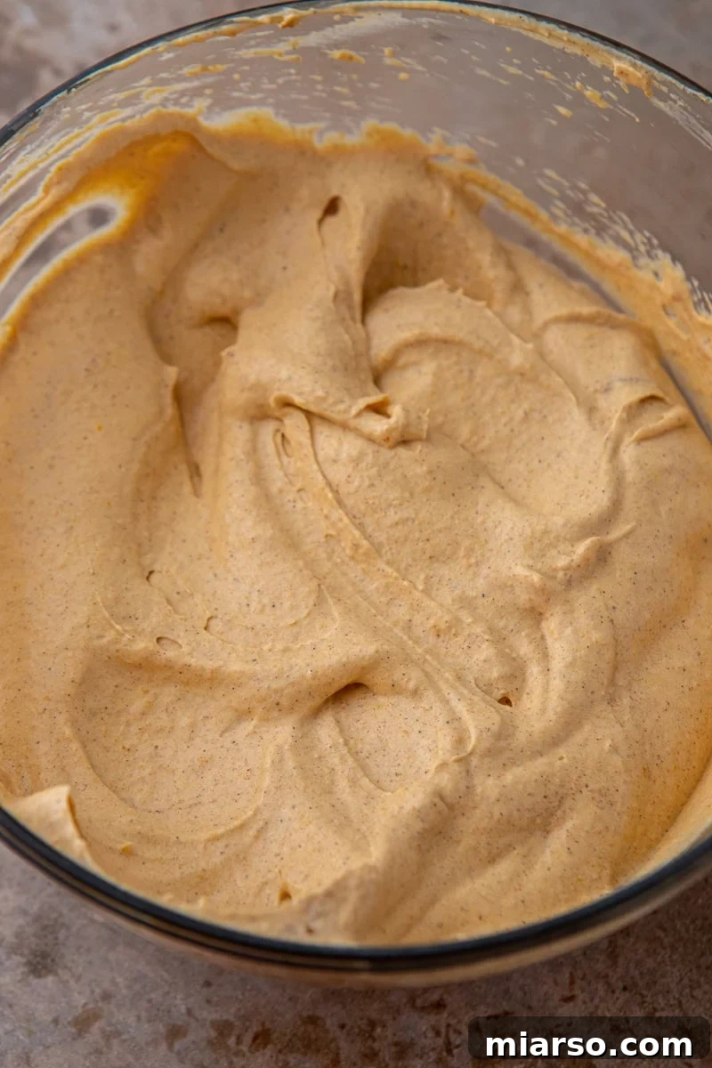 Pumpkin Pie Perfection Crumbl Style 9 Pumpkin pie mousse filling in a bowl