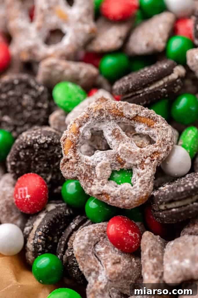Christmas muddy buddies - a vibrant red and green holiday snack