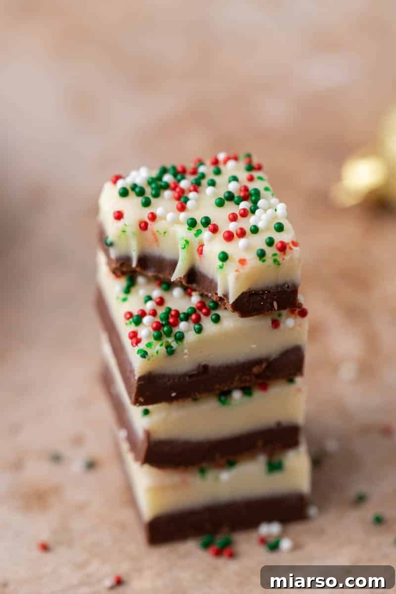 Holiday Showstopper Layered Fudge 9 Stack of layered Christmas fudge