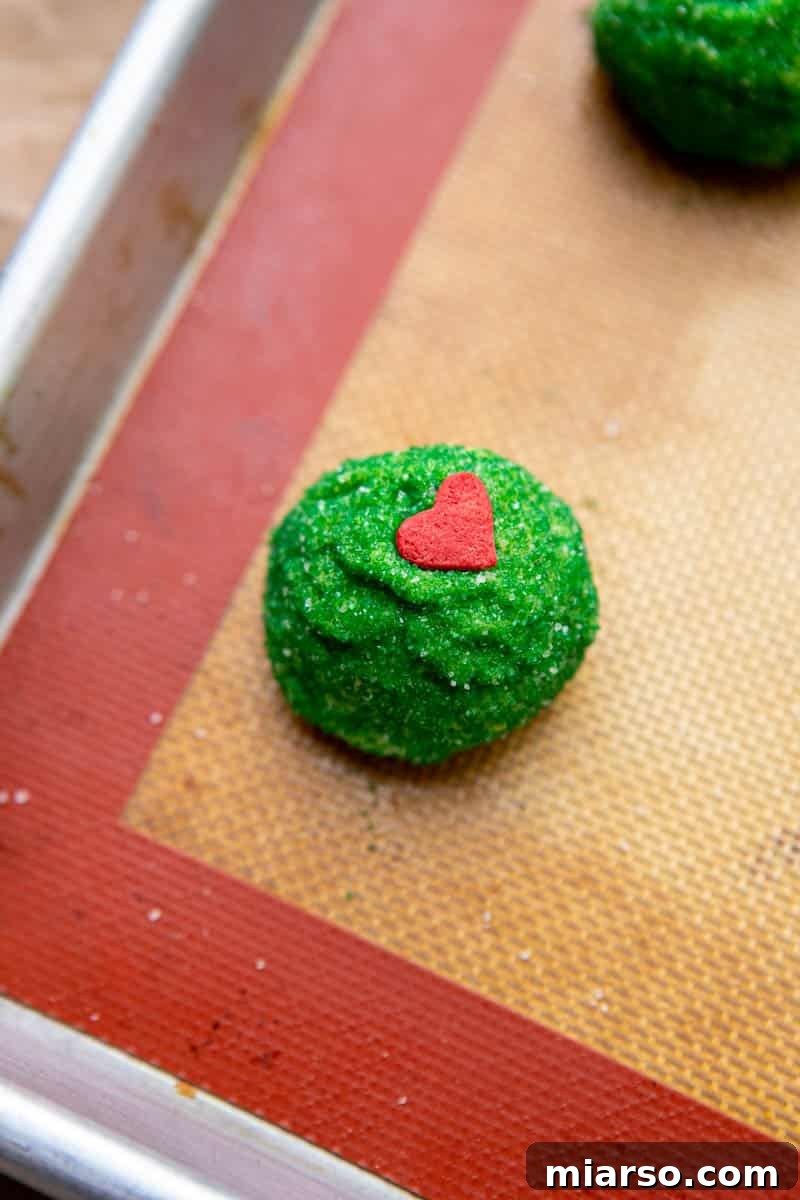 Grinch's Heart-Melting Sugar Cookies 10 Another view of cookie dough on a baking sheet, spaced for even baking
