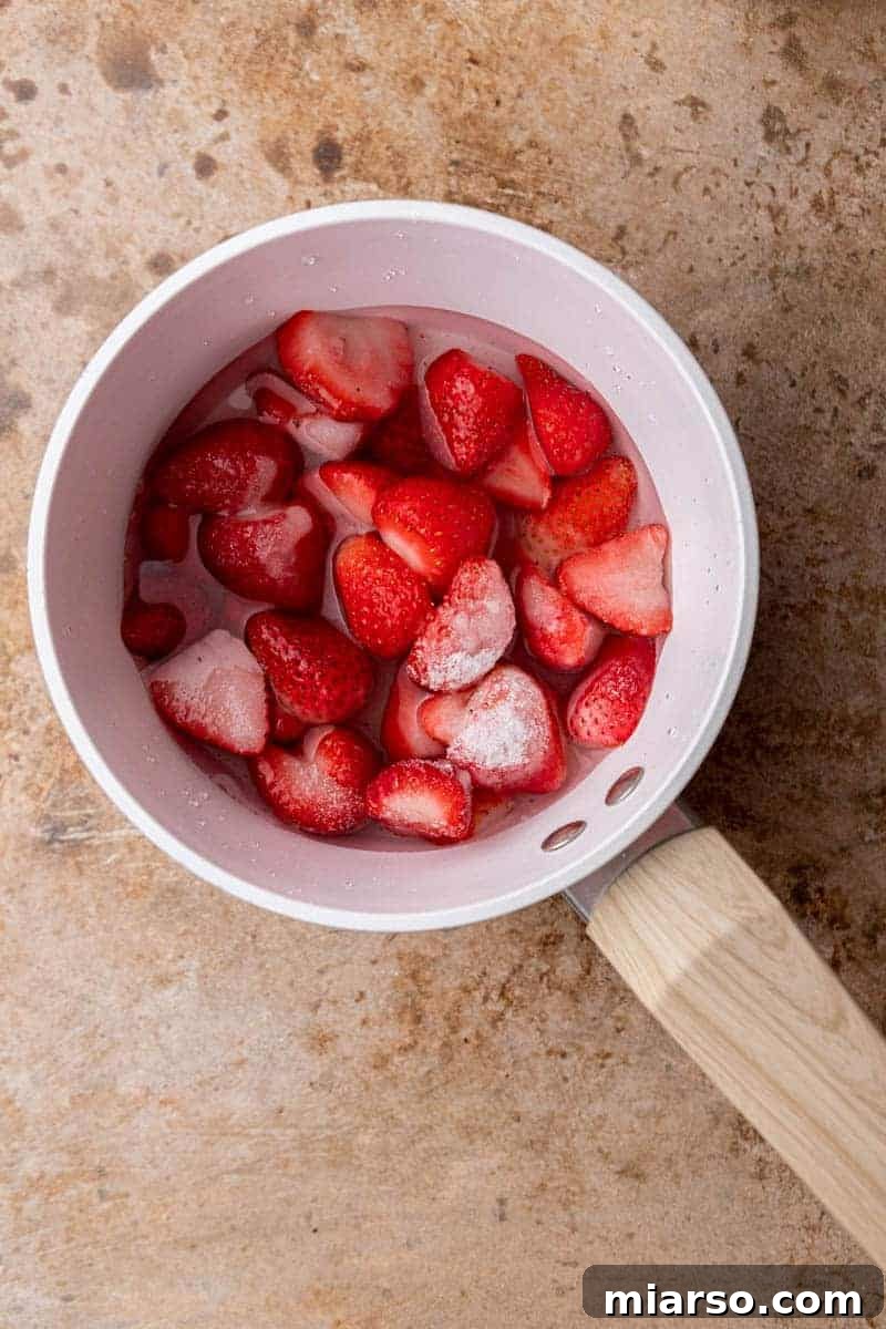 Homemade Strawberry Milk Made Easy 4 strawberries in a pot