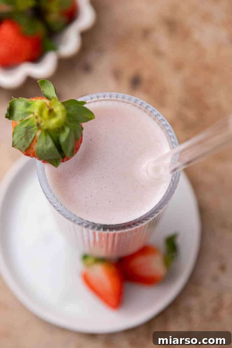 Homemade Strawberry Milk Made Easy 10 Overhead shot of strawberry milk