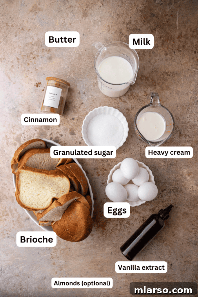 Various ingredients for the brioche French toast casserole laid out on a kitchen counter.