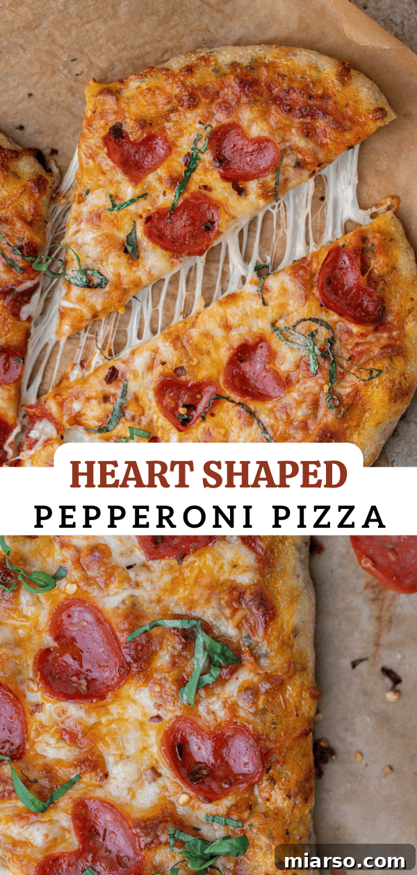 Delicious heart-shaped pizza perfect for a romantic occasion, ready to be pinned