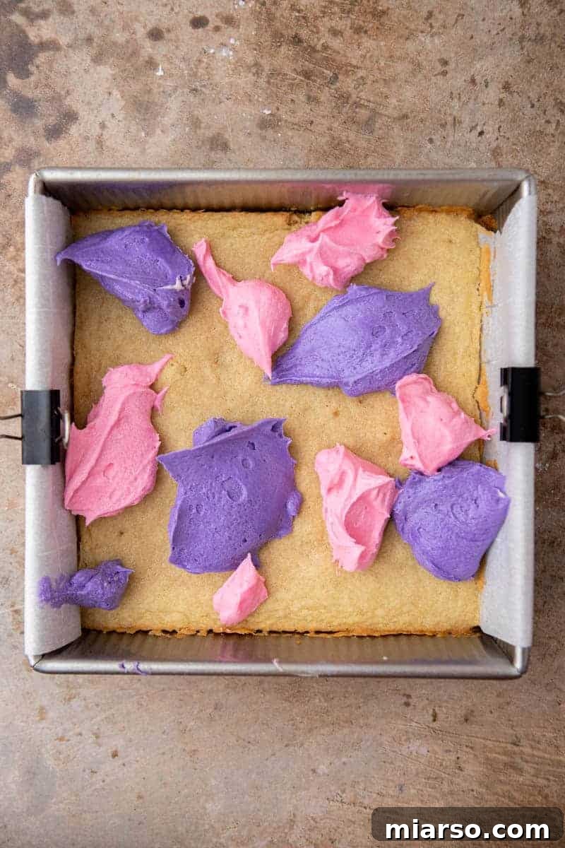 Sweetheart Sugar Cookie Bars 8 Dollops of pink and purple frosting on cookie dough