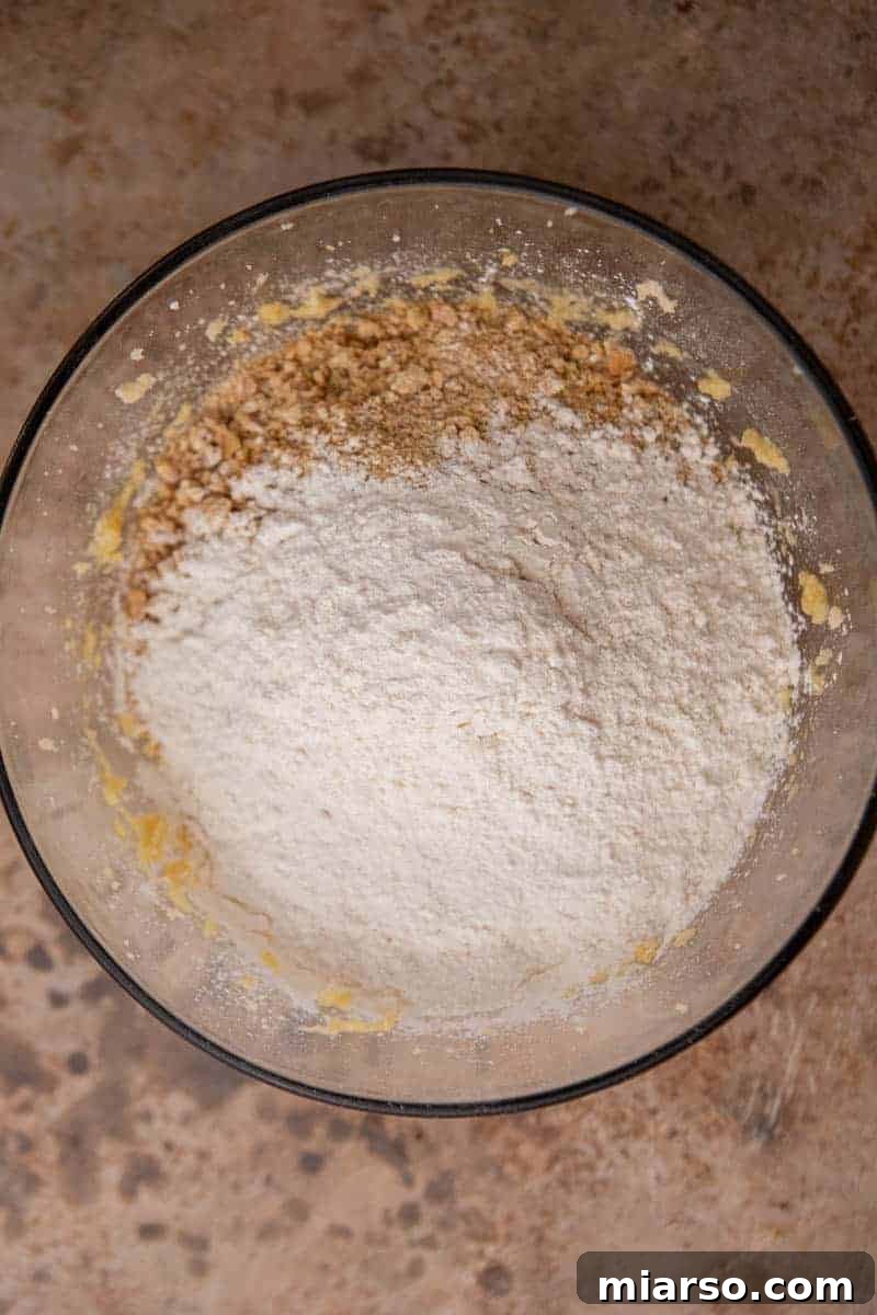 Luscious Lemon Crumbl Cheesecake Cookies 5 Dry ingredients for cookies in a bowl