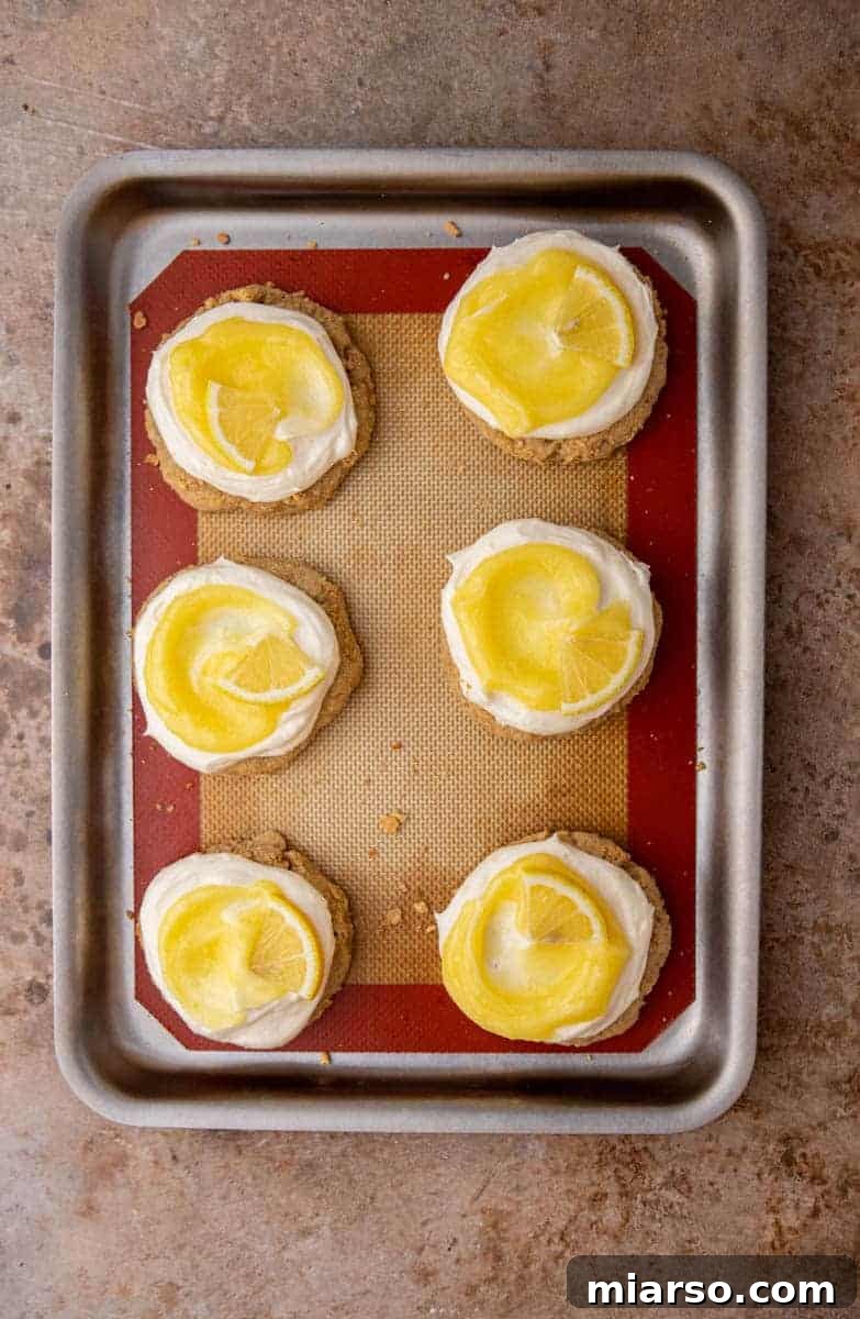 Luscious Lemon Crumbl Cheesecake Cookies 9 Fully decorated lemon cheesecake cookies
