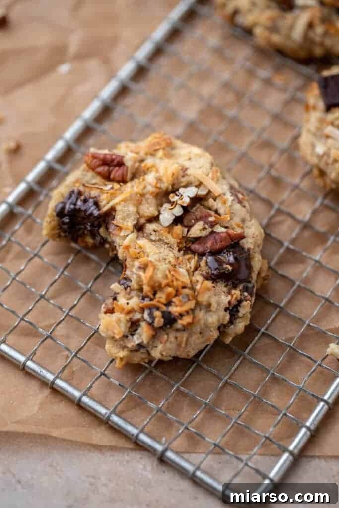 Crumbl cowboy cookie with a bite taken out of it
