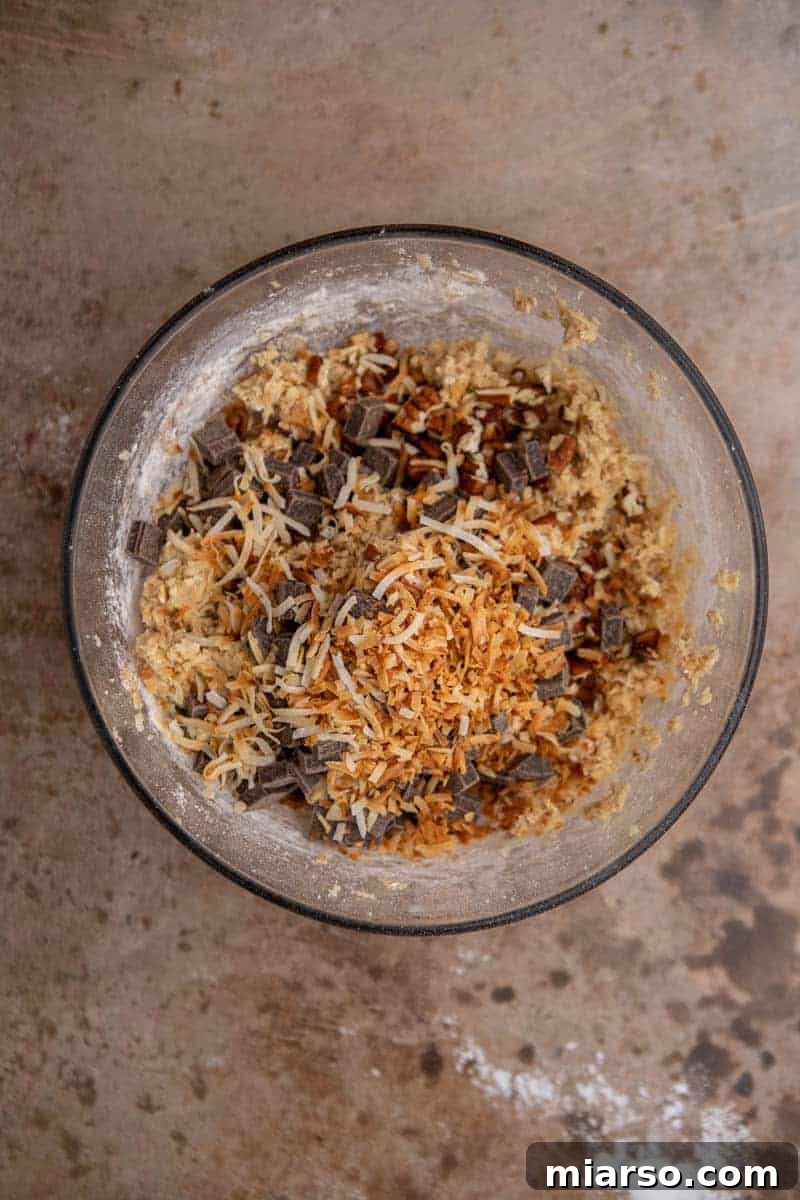 Mix-ins aded to the bowl of cookie dough