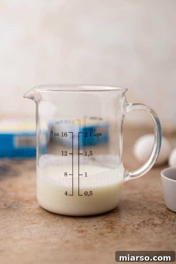 Buttermilk in a glass to make cornbread mix better