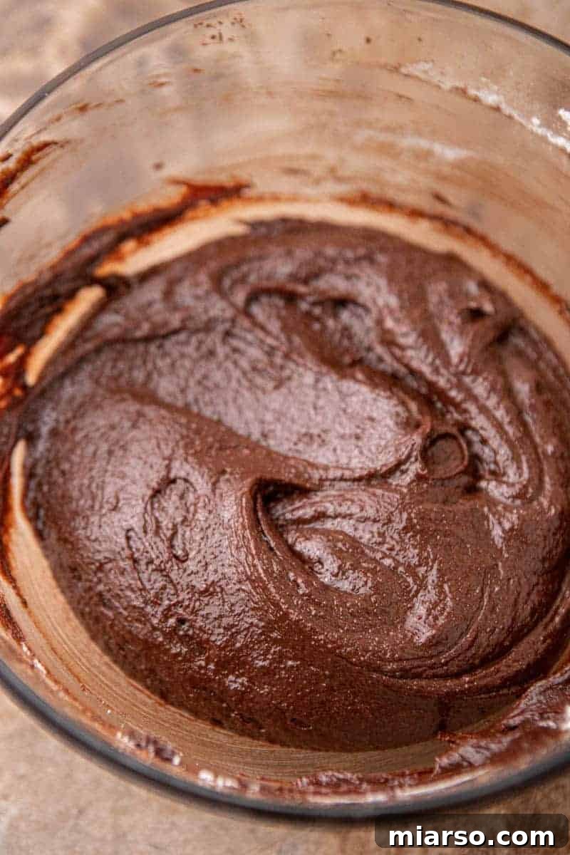 Decadent Oreo Fudge Brownies 7 Smooth, rich brownie batter in a bowl, ready for baking.
