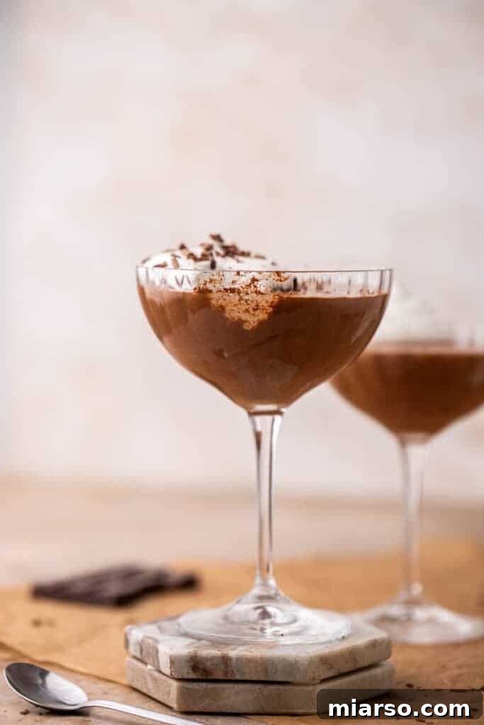 Small batch chocolate mousse - Mousse au chocolat in serving glasses with whipped cream