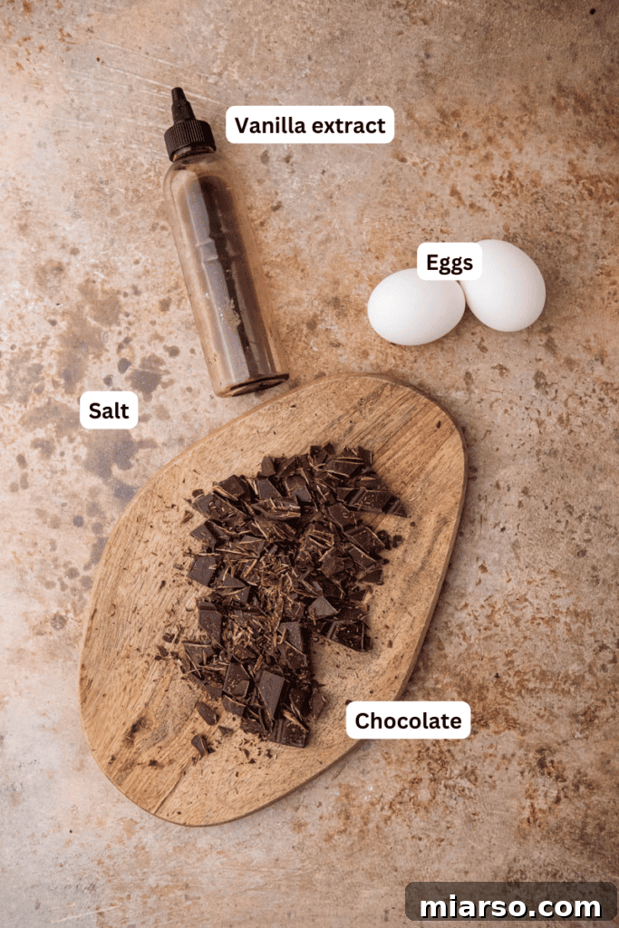 Ingredients for chocolate mousse laid out on a kitchen counter
