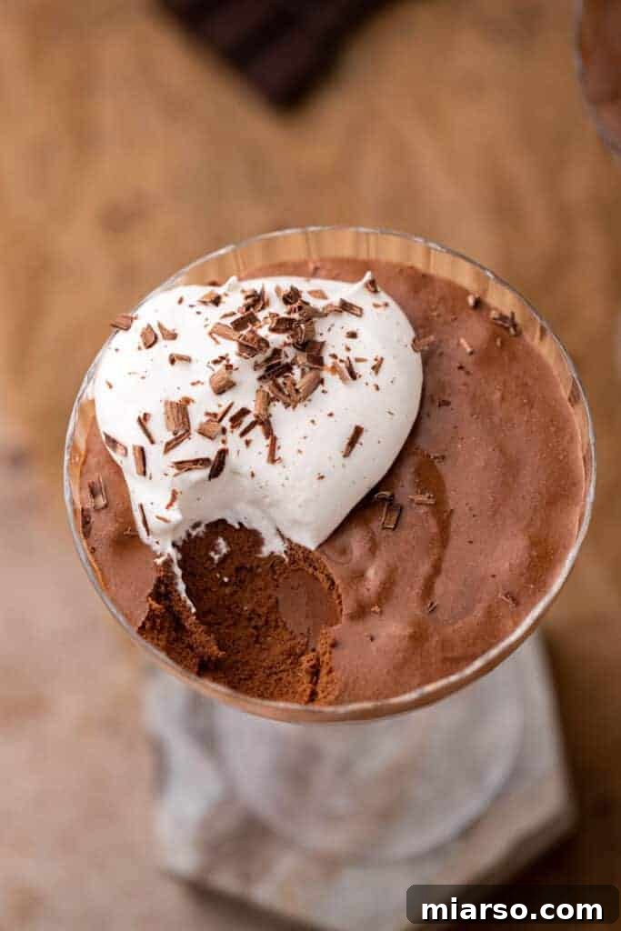Close-up of chocolate mousse texture in a glass