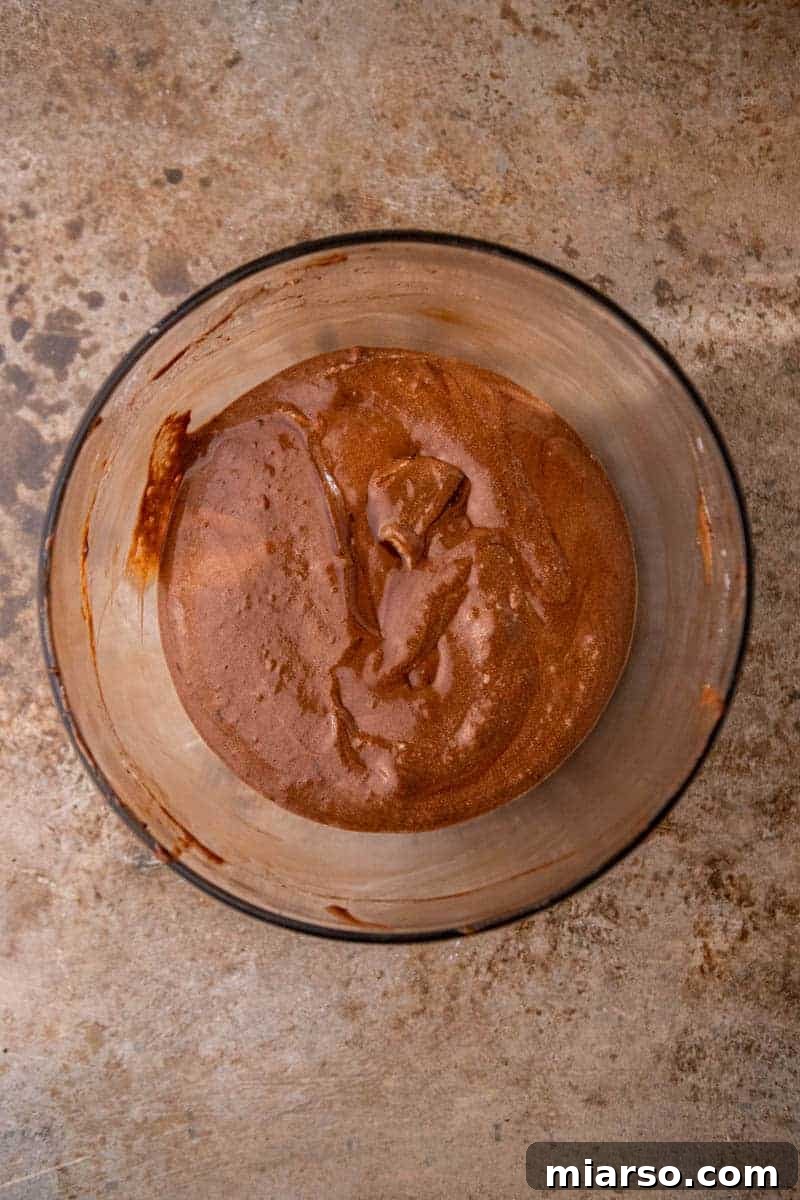Chocolate mousse mixture in a large bowl before chilling