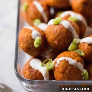 Delicious and healthy baked buffalo chicken meatballs, perfect for any occasion.